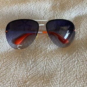 Marc Jacobs Aviator Sunglasses with Orange accents.
